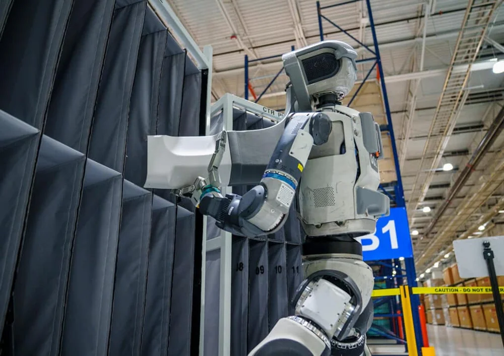 Boston Dynamics Atlas product version in an industrial setting