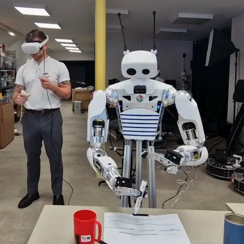 Reachy 2 robot being teleoperated with a VR headset