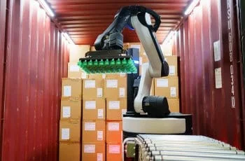 Boston Dynamics Stretch unloading boxes from a container